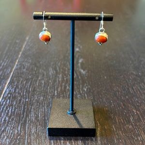 Goldstone bead pierced earrings set in sterling silver. Handmade!